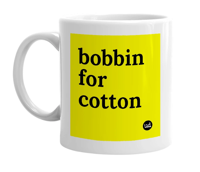 White mug with 'bobbin for cotton' in bold black letters