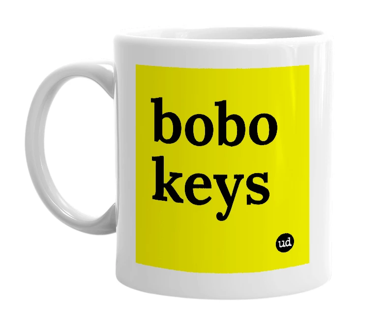 White mug with 'bobo keys' in bold black letters