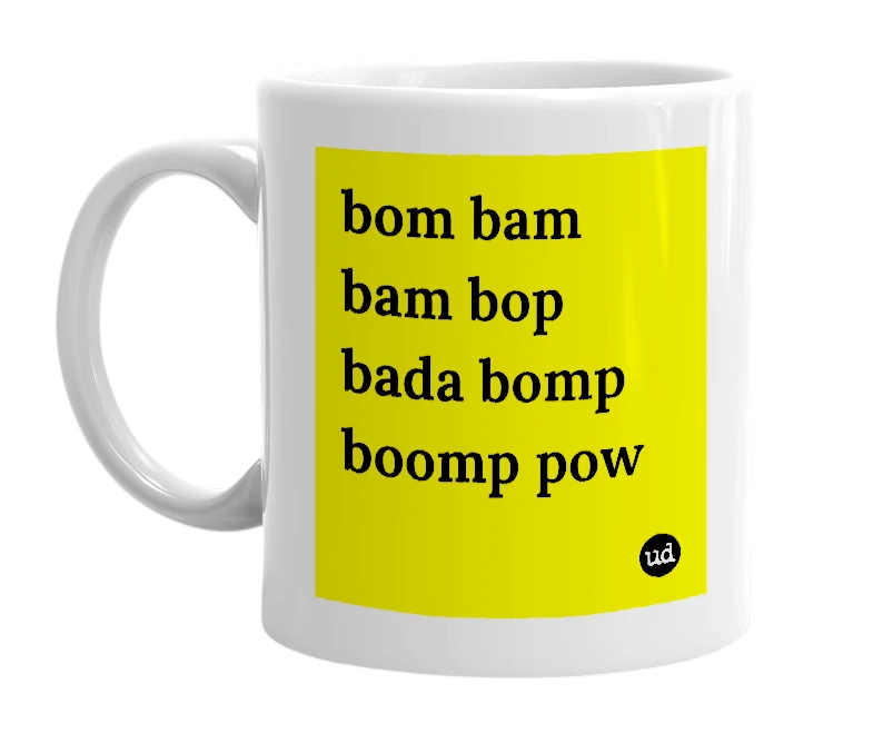 White mug with 'bom bam bam bop bada bomp boomp pow' in bold black letters