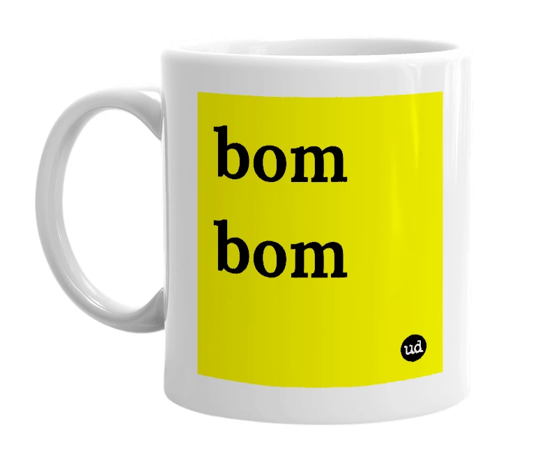 White mug with 'bom bom' in bold black letters