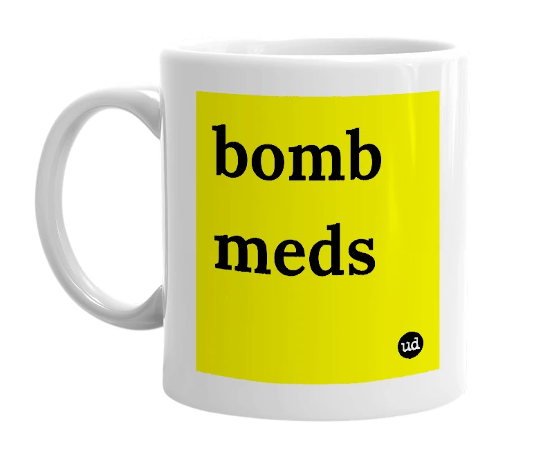White mug with 'bomb meds' in bold black letters