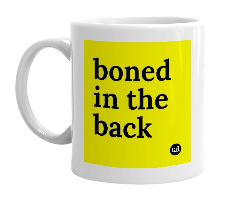 White mug with 'boned in the back' in bold black letters