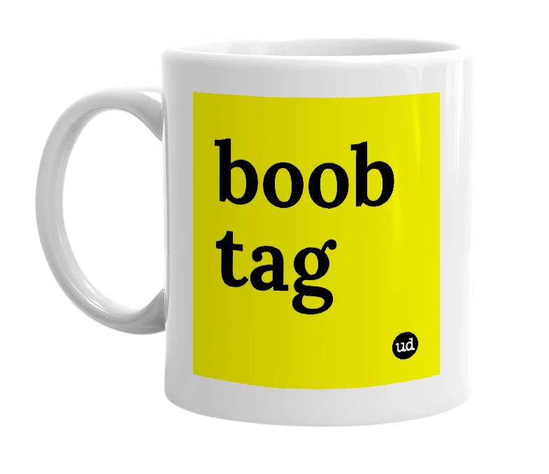 White mug with 'boob tag' in bold black letters