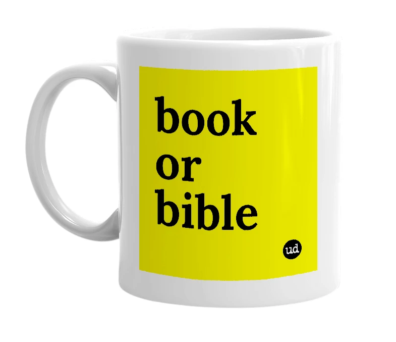 White mug with 'book or bible' in bold black letters