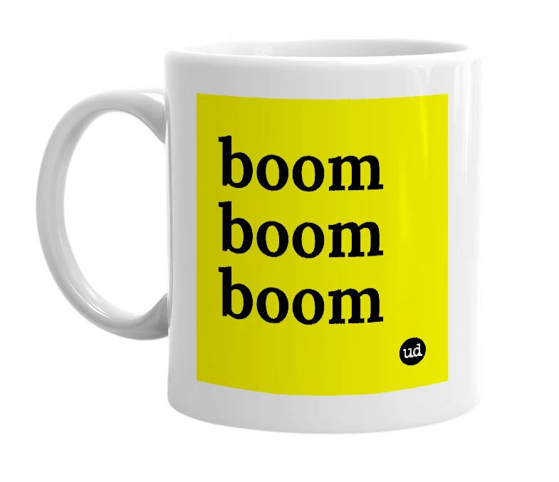 White mug with 'boom boom boom' in bold black letters