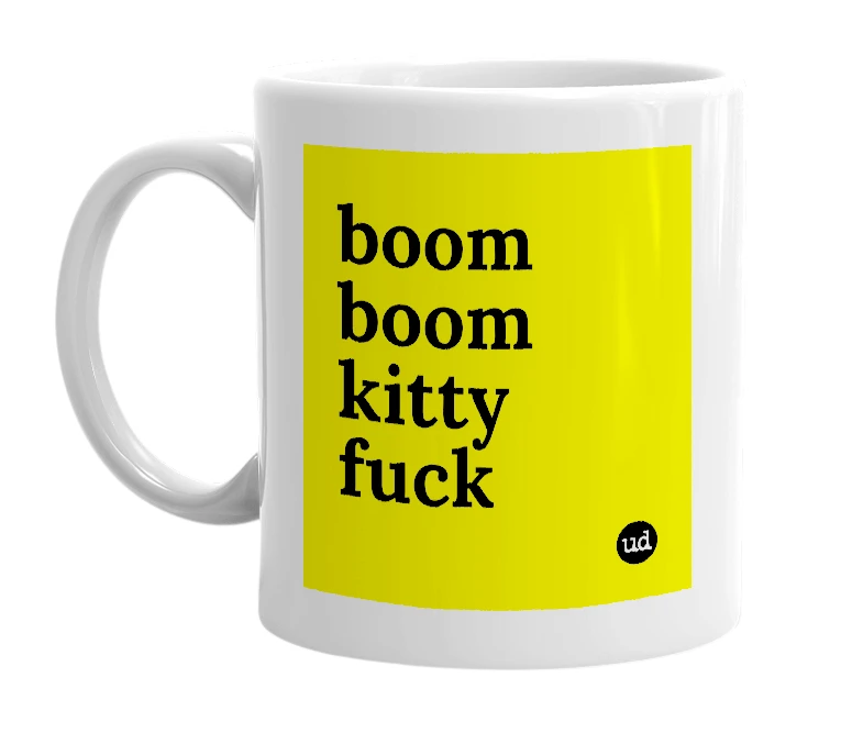 White mug with 'boom boom kitty fuck' in bold black letters