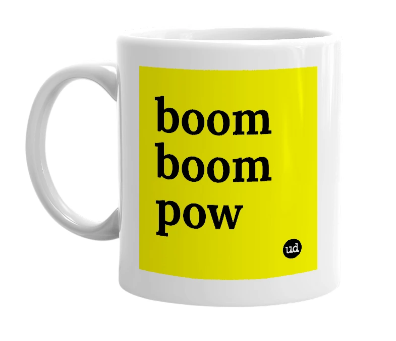 White mug with 'boom boom pow' in bold black letters