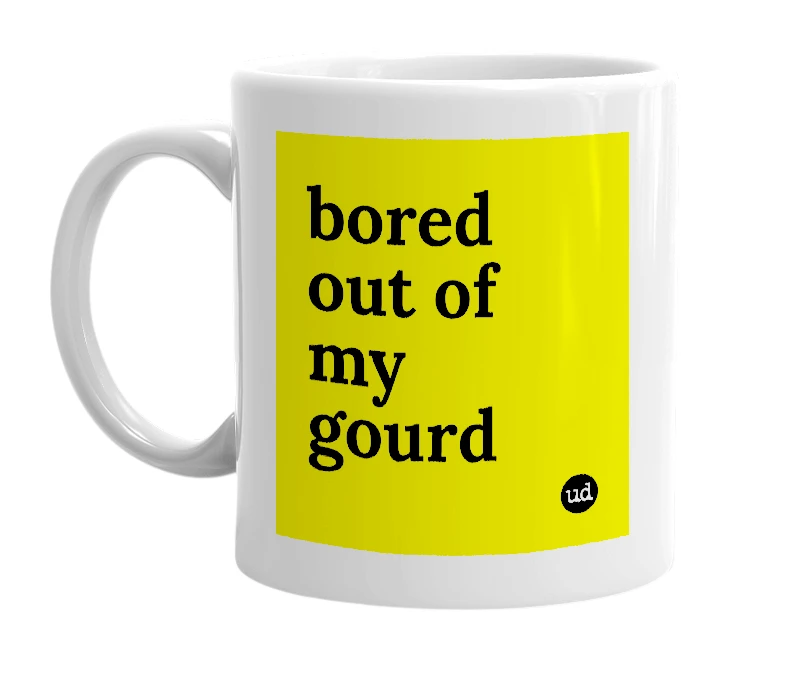 White mug with 'bored out of my gourd' in bold black letters