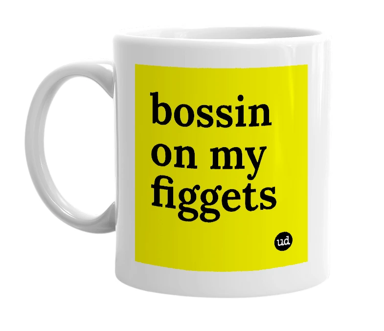 White mug with 'bossin on my figgets' in bold black letters