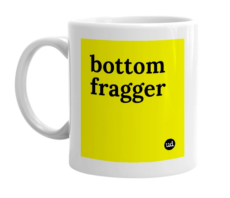 White mug with 'bottom fragger' in bold black letters
