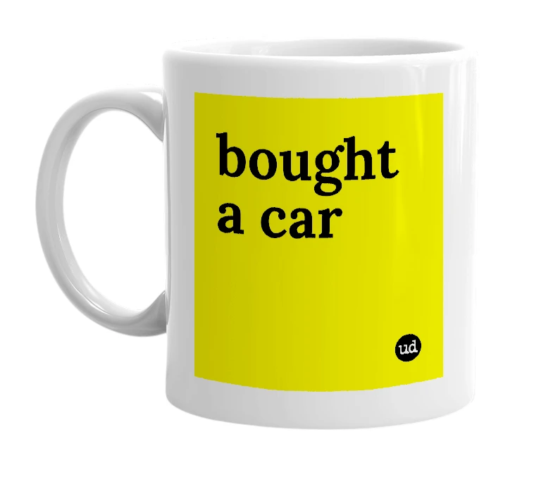 White mug with 'bought a car' in bold black letters