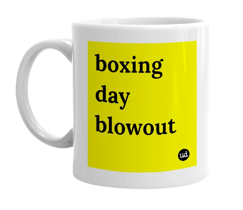 White mug with 'boxing day blowout' in bold black letters