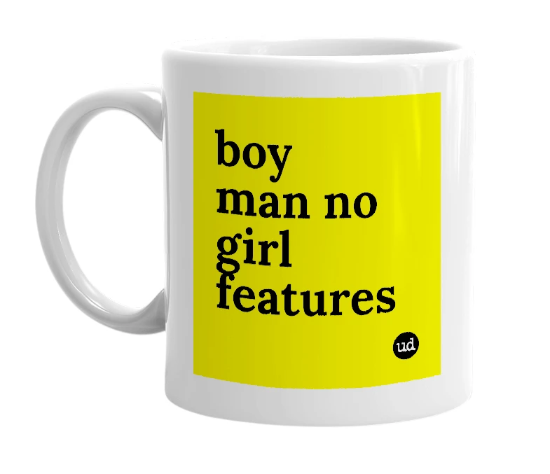 White mug with 'boy man no girl features' in bold black letters