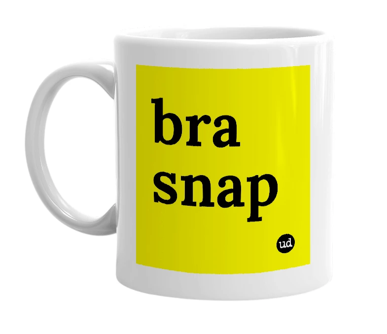White mug with 'bra snap' in bold black letters