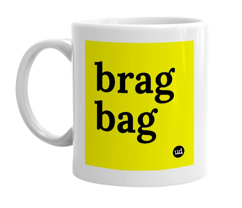 White mug with 'brag bag' in bold black letters