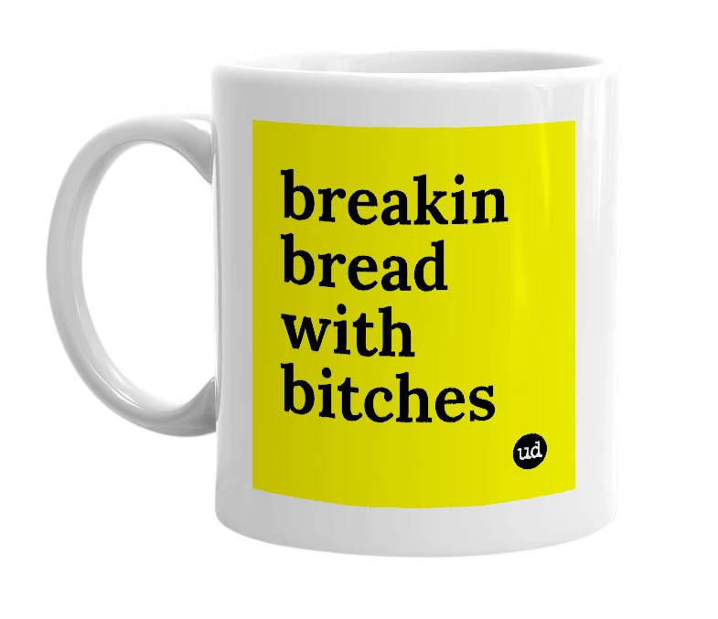 White mug with 'breakin bread with bitches' in bold black letters