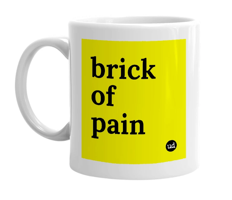 White mug with 'brick of pain' in bold black letters