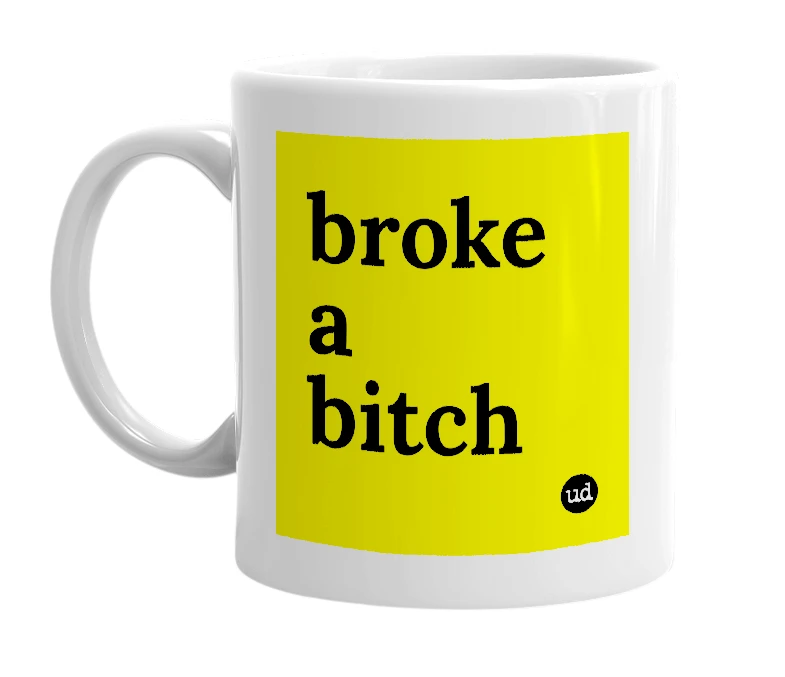 White mug with 'broke a bitch' in bold black letters