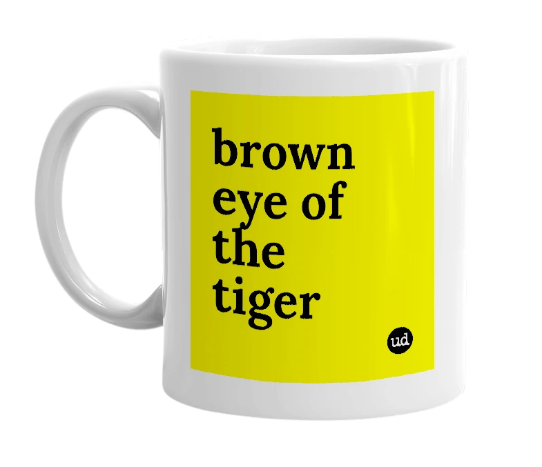 White mug with 'brown eye of the tiger' in bold black letters