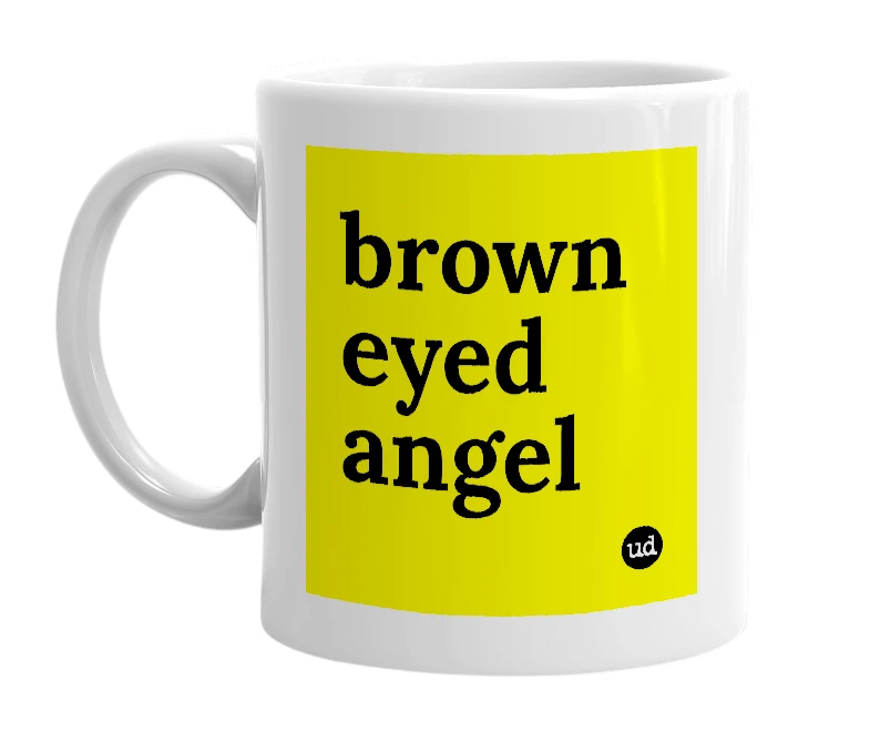 White mug with 'brown eyed angel' in bold black letters