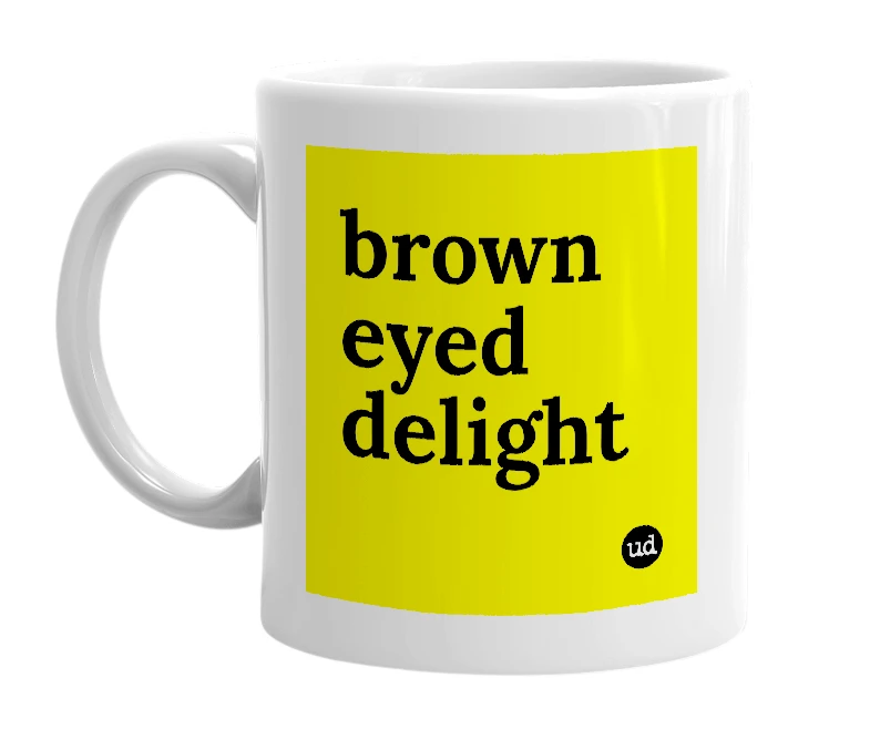 White mug with 'brown eyed delight' in bold black letters