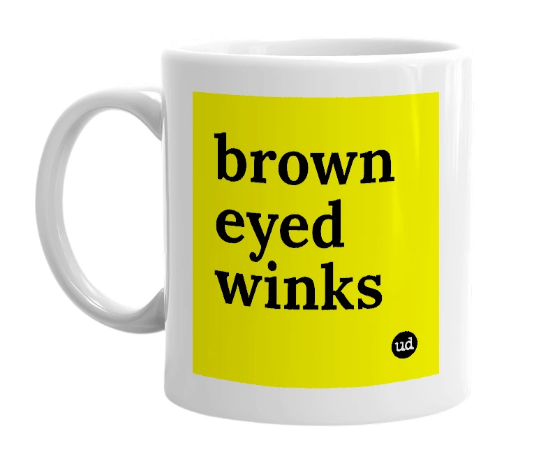 White mug with 'brown eyed winks' in bold black letters