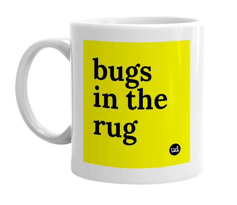 White mug with 'bugs in the rug' in bold black letters
