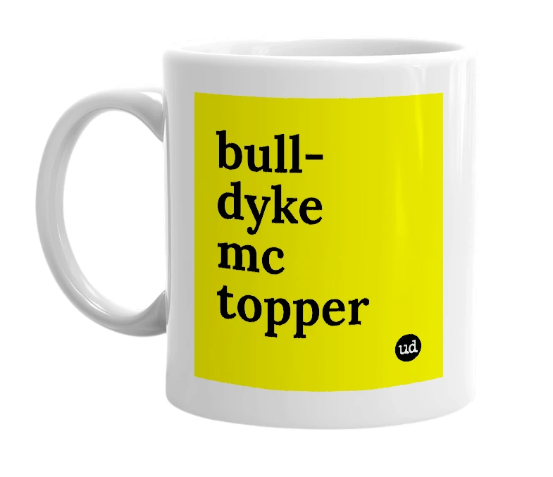 White mug with 'bull-dyke mc topper' in bold black letters