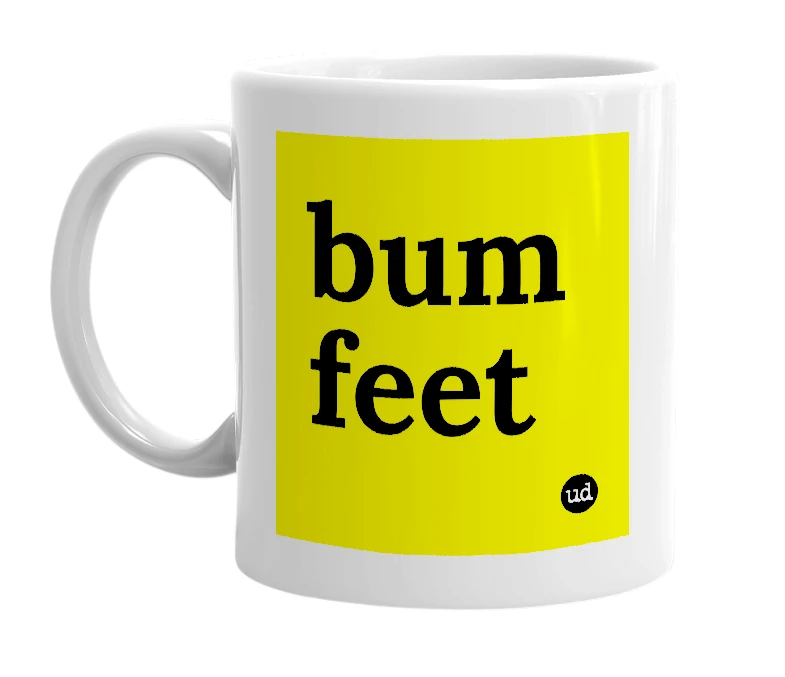 White mug with 'bum feet' in bold black letters