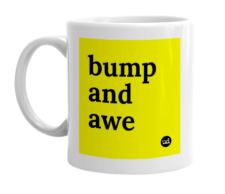 White mug with 'bump and awe' in bold black letters