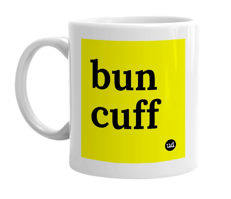 White mug with 'bun cuff' in bold black letters