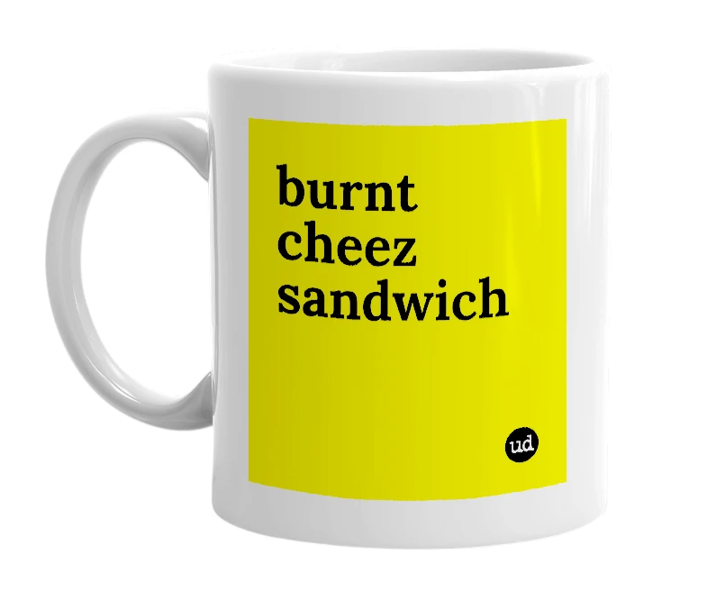 White mug with 'burnt cheez sandwich' in bold black letters