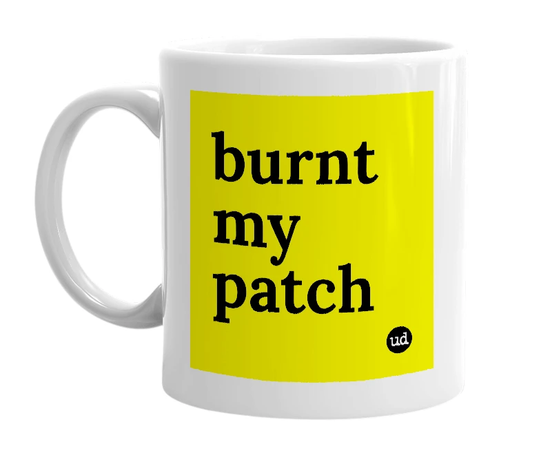 White mug with 'burnt my patch' in bold black letters