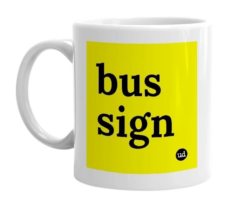 White mug with 'bus sign' in bold black letters