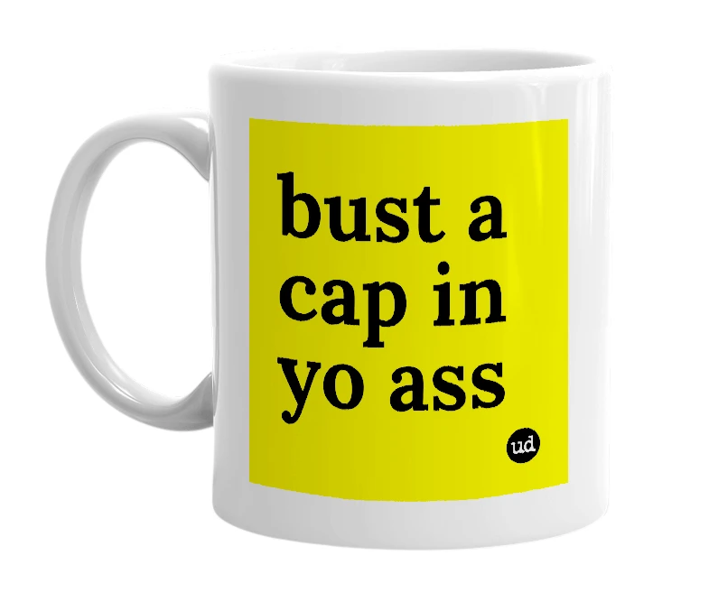 White mug with 'bust a cap in yo ass' in bold black letters