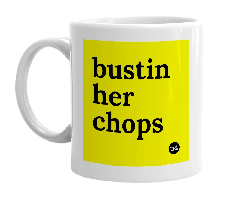 White mug with 'bustin her chops' in bold black letters