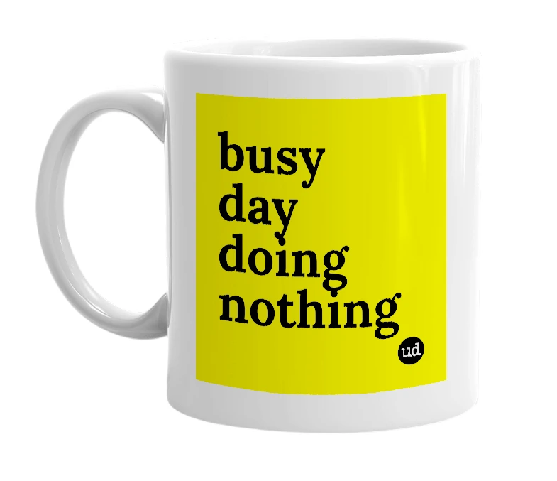 White mug with 'busy day doing nothing' in bold black letters