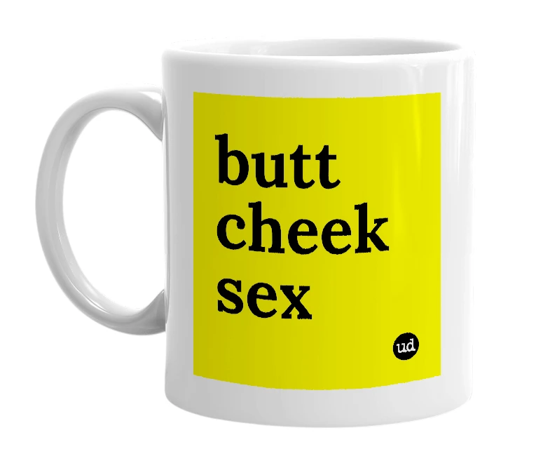 White mug with 'butt cheek sex' in bold black letters