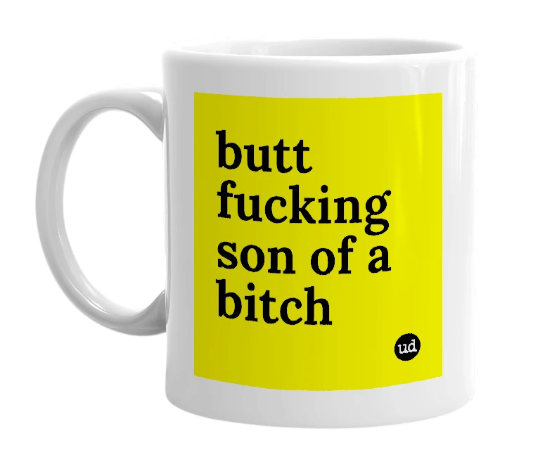 White mug with 'butt fucking son of a bitch' in bold black letters