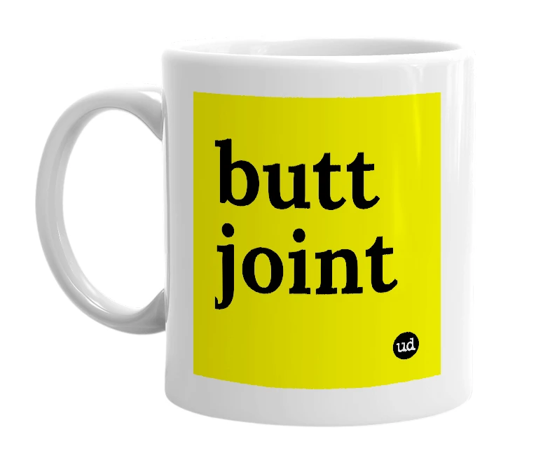 White mug with 'butt joint' in bold black letters