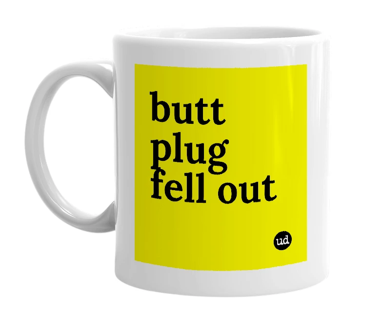 White mug with 'butt plug fell out' in bold black letters