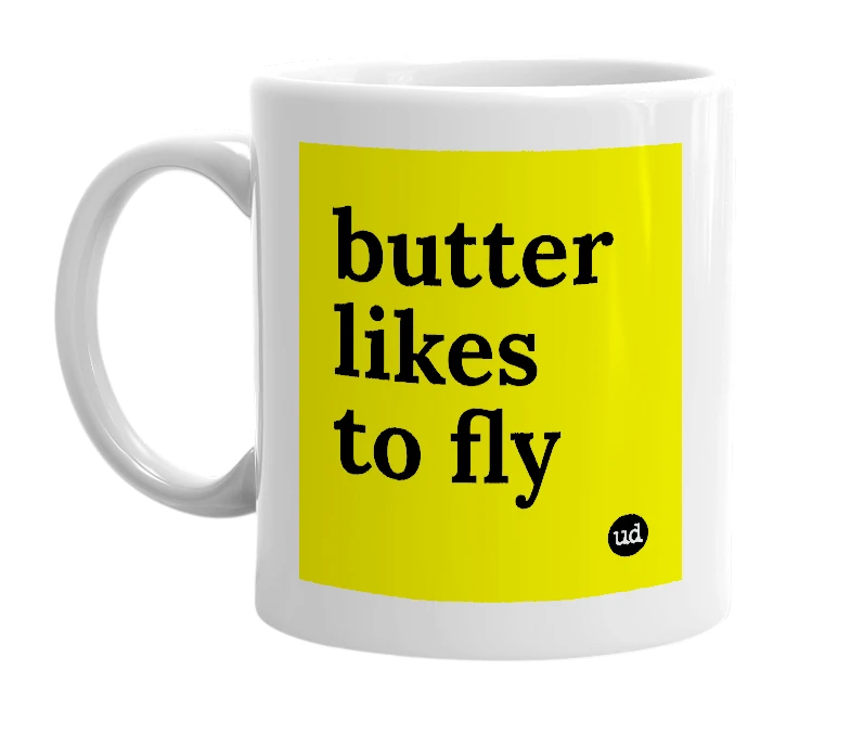 White mug with 'butter likes to fly' in bold black letters