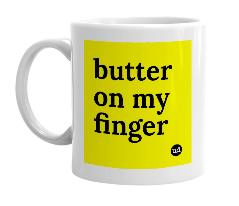White mug with 'butter on my finger' in bold black letters