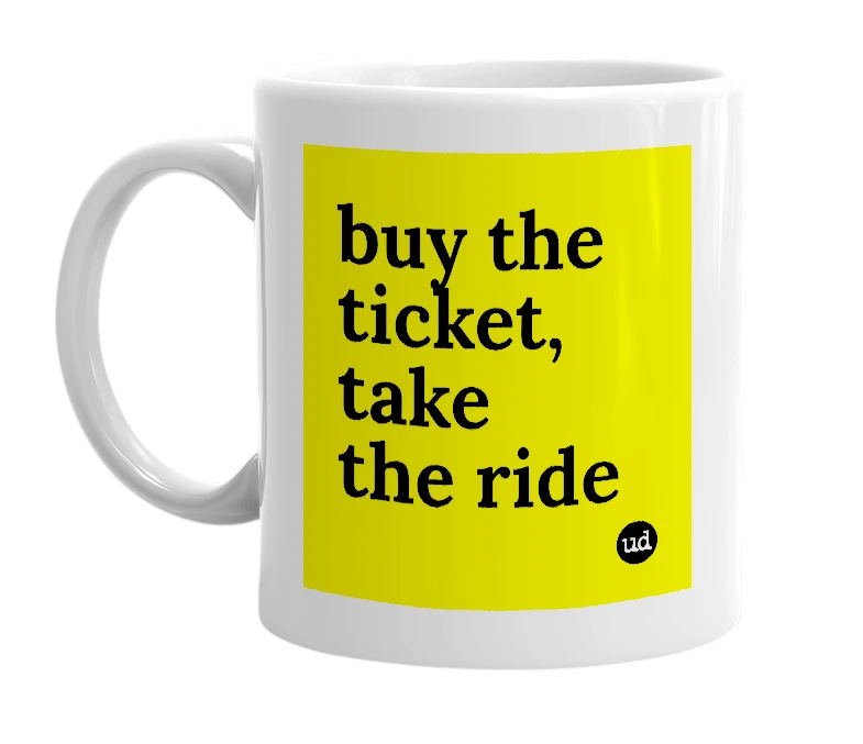 White mug with 'buy the ticket, take the ride' in bold black letters