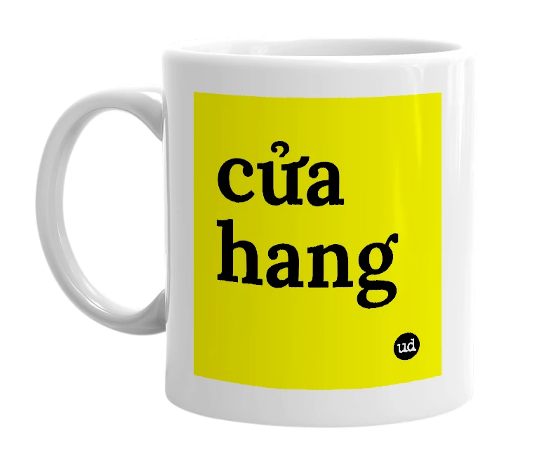 White mug with 'cửa hang' in bold black letters