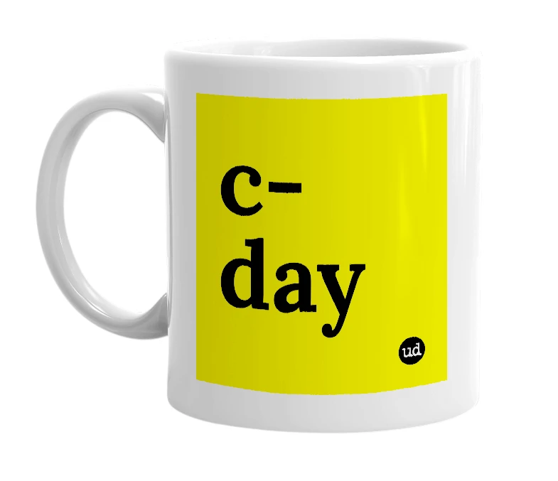 White mug with 'c-day' in bold black letters