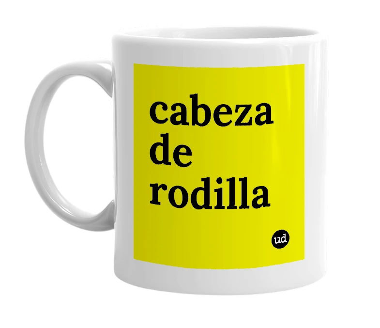 White mug with 'cabeza de rodilla' in bold black letters
