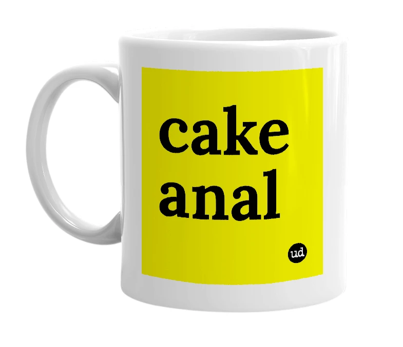 White mug with 'cake anal' in bold black letters