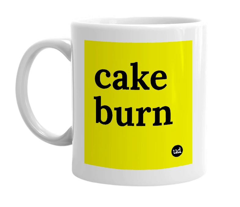 White mug with 'cake burn' in bold black letters