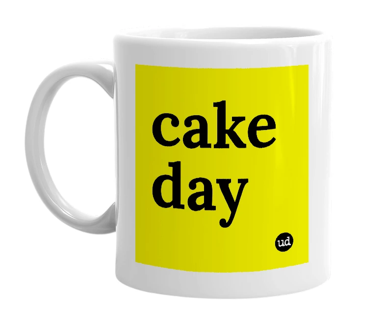 White mug with 'cake day' in bold black letters